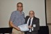 Dr. Nagib Callaos, General Chair, giving Dr. Fernando F. Padró the best paper award certificate of the session "Interdisciplinary Communication." The title of the awarded paper is "The Doctoral Studies Paradox: Indigenous Cultural Paradigms versus Western-Based Research Practices."